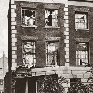 Corner house partially wrecked by bomb dropped from a zeppelin, London, England. Photograph, 1917