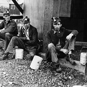 KENTUCKY: COAL MINERS, 1935. Coal miners in Jenkins, Kentucky. Photograph by Ben Shahn