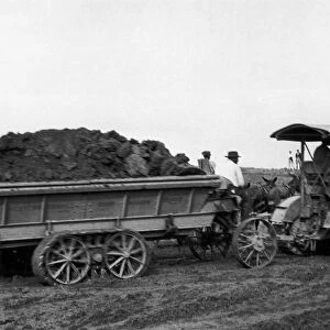 MISSOURI: LEVEES, 1927. A tractor-drawn wagon being used in a levee construction