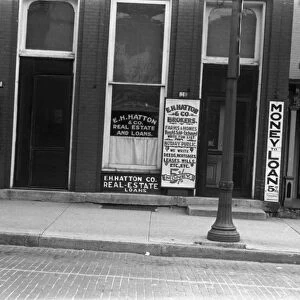 REAL ESTATE OFFICE, 1938. Real estate and loan office in Marysville, Ohio
