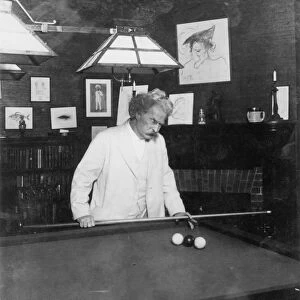 SAMUEL L. CLEMENS (1835-1910). Mark Twain: American humourist and writer. Photographed at home