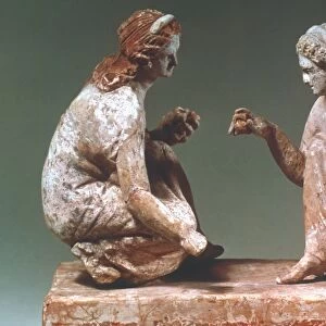 Women playing Knucklebones. Terracotta, South Italian Greek, about 300 BC. Height: 8 inches