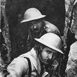 WORLD WAR I: TELEPHONE. A British signal officer listening in on a tapped German