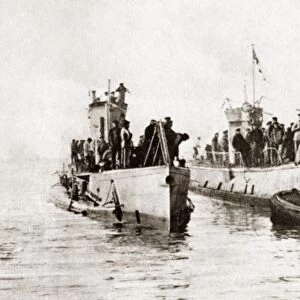 WORLD WAR I: U-BOATS. Three surrendered U-Boats with the German crews who brought them to England