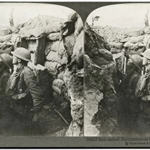 WWI: TRENCHES, c1915. Entrenched Highlanders on the lookout using mirror periscope