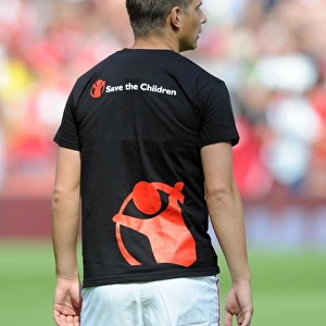 Andrey Arshavin (Arsenal) in a Save the Children t shirt. Arsenal 1: 1 New York Red Bulls