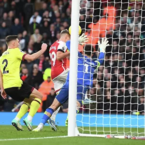 Arsenal Takes Early Lead Against Burnley: Leandro Trossard's Header at Emirates Stadium (2023-24)