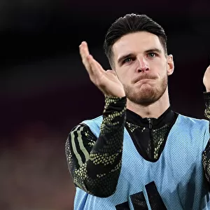 Arsenal's Declan Rice Applauds Fans During Carabao Cup Match vs West Ham United, 2023-24