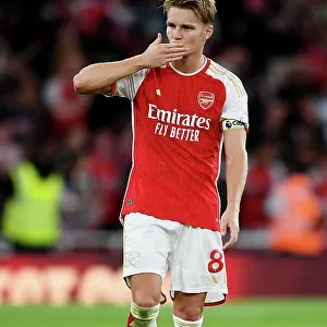 Arsenal's Martin Odegaard Celebrates with Fans after Arsenal v Manchester City, 2023-24 Premier League