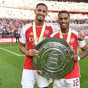 Arsenal's Saliba and Timber Celebrate at 2023 Community Shield Against Manchester City