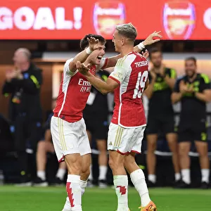 Arsenal's Trossard and Tierney Celebrate Goals Against FC Barcelona in 2023 Pre-Season Friendly