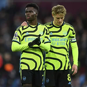 Dejected Arsenal Duo: Aston Villa Outshines Gunners in 2023-24 Premier League Clash