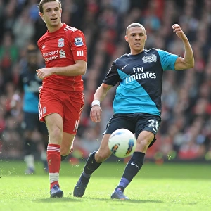 Kieran Gibbs vs. Jordan Henderson: Intense Battle at Anfield - Liverpool vs. Arsenal, Premier League 2011-12