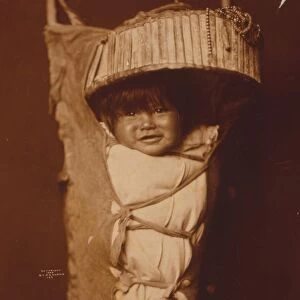 An Apache infant in cradleboard, c1903. Photograph by Edward Curtis (1868-1952)