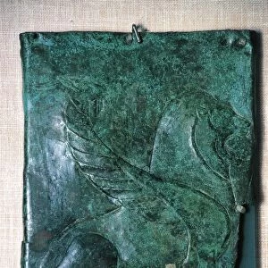 Italy, Umbria, Bronze slab depicting a mythological animal, from the excavation site of Castel San Mariano