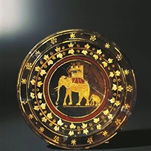Red-figure pathera depicting an elephant prepared for battles from the Pocola deorum plates