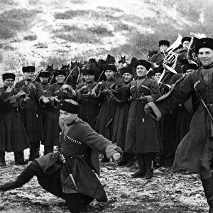 Soviet red army cossacks enjoying a little downtime by giving a traditional dance performance, february 1938