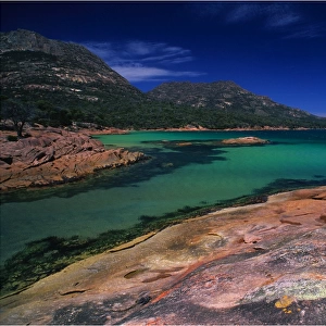 The beautiful aqua waters of honeymoon Bay on the Freycinet Peninsular, East coast of Tasmania
