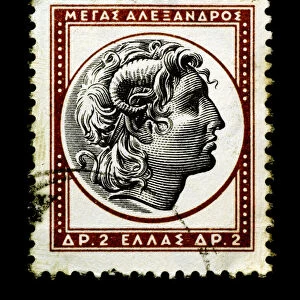 Alexander the Great on Greek stamp isolated in black