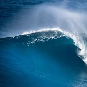 Huge ocean wave breaking on the North Shore of Maui