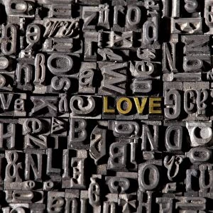 Old lead type forming the words love