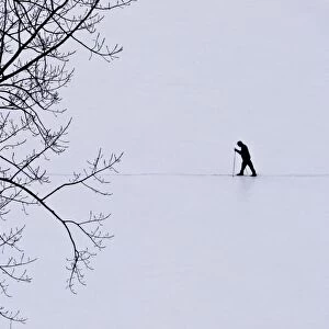 Solitary person in snow