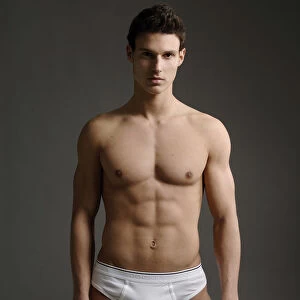 Young athlete in white briefs