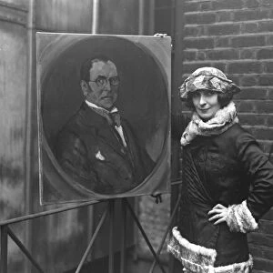 Lady Lavery with her painting of Sir John Lavery 1923