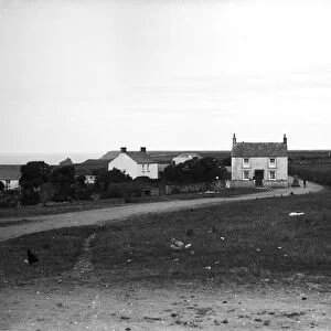Houses on the north side of the green, The Lizard, Landewednack, Cornwall. Early 1900s