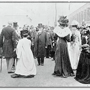 Bouquets being presented by red-cloaked Irish girls at the Franco-British Exhibition, 1908 (b/w photo)