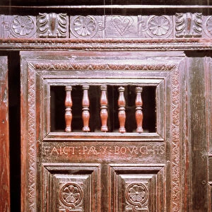 Furniture: large peasant wardrobe in carved wood. Made by Bourchis, 1669