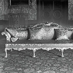 A Sofa from a set of giltwood drawing room furniture, Alnwick Castle, Northumberland, from The English Country House (b/w photo)