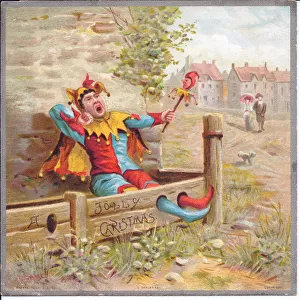 Victorian Christmas card of a waking jester caught in a village stocks, c
