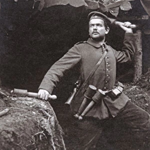 WWI German grenadier armed with stick grenades, 1915 (b / w photo)