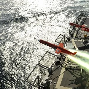 A BQM-74E aerial drone launches from the guided-missile frigate USS Thach