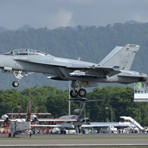 An F / A-18 Super Hornet of the U. S. Navy taking off from Langkawi Airport