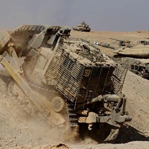 An Israel Defense Force Caterpillar D-9 clearing the way