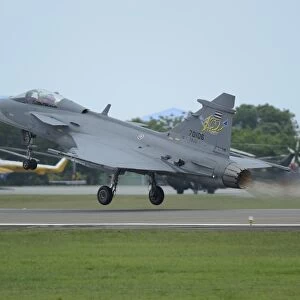 A Saab JAS 39 Gripen C of the Royal Thai Air Force taking off