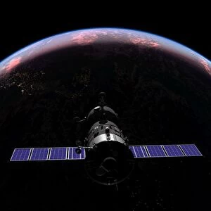 A Soyuz TMA-M spacecraft soars over the Atlantic Ocean at sunset
