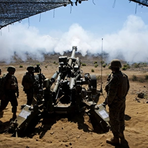 U. S. Marines fire the M777A2 Howitzer