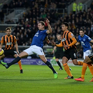 Intense Rivalry: Jagielka vs. Davies Battle at KC Stadium - Hull City vs. Everton, Premier League