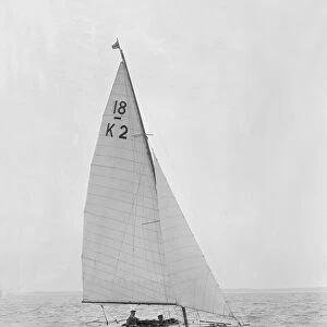 The 18-foot keelboat Prudence (K2) under sail, 1922. Creator: Kirk & Sons of Cowes