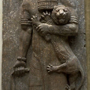Hero Gilgamesh mastering a lion, 722-705 BC. Artist: Assyrian Art