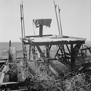 Possibly: Farm machinery left on abandoned dry land farm in Columbian Basin, Washington, 1939. Creator: Dorothea Lange