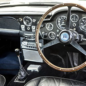 Steering wheel and dashboard of a 1965 Aston Martin DB5. Creator: Unknown