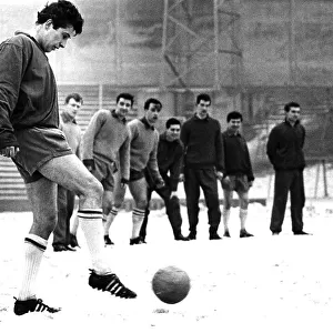 Millwall Footballer Dave Jones, during training in the snow