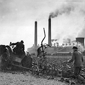 Ploughing in Warwickshire with Harris Hall electricity power station in the background