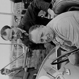 1948 British Grand Prix, Silverstone portrait, sitting in car with cigarette in