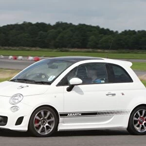 Grand Prix Shootout: Driver coach Danny Watts demonstrates the capabilities of the FIAT 500 Abarth to Ben Cooper