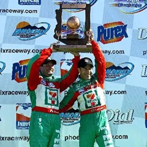 Indy Racing League: Race winner Tony Kanaan, right, celebrates with Andretti Green Racing team owner, Michael Andretti on the podium